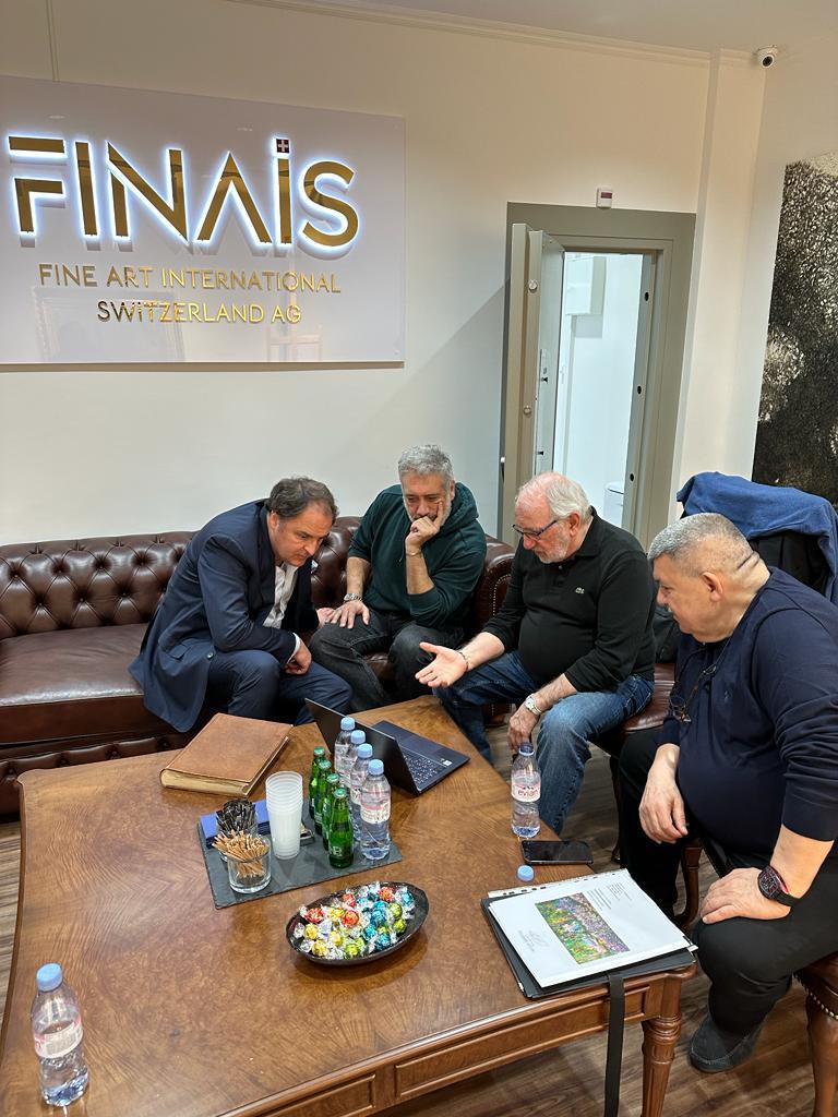 Andranik Ghazarian in the FINAIS Fine Art International Switzerland office with (Notebook: Paperwork, and what it is worth)