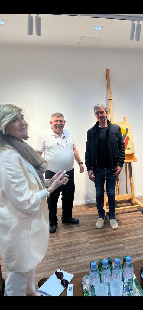 Andranik Ghazarian with, beside a work under examination (Studio: Two readings of the same canvas)