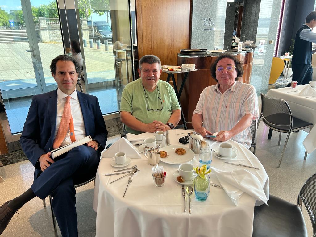 Andranik Ghazarian with (Notebook: Breakfast, and a picture on a phone)