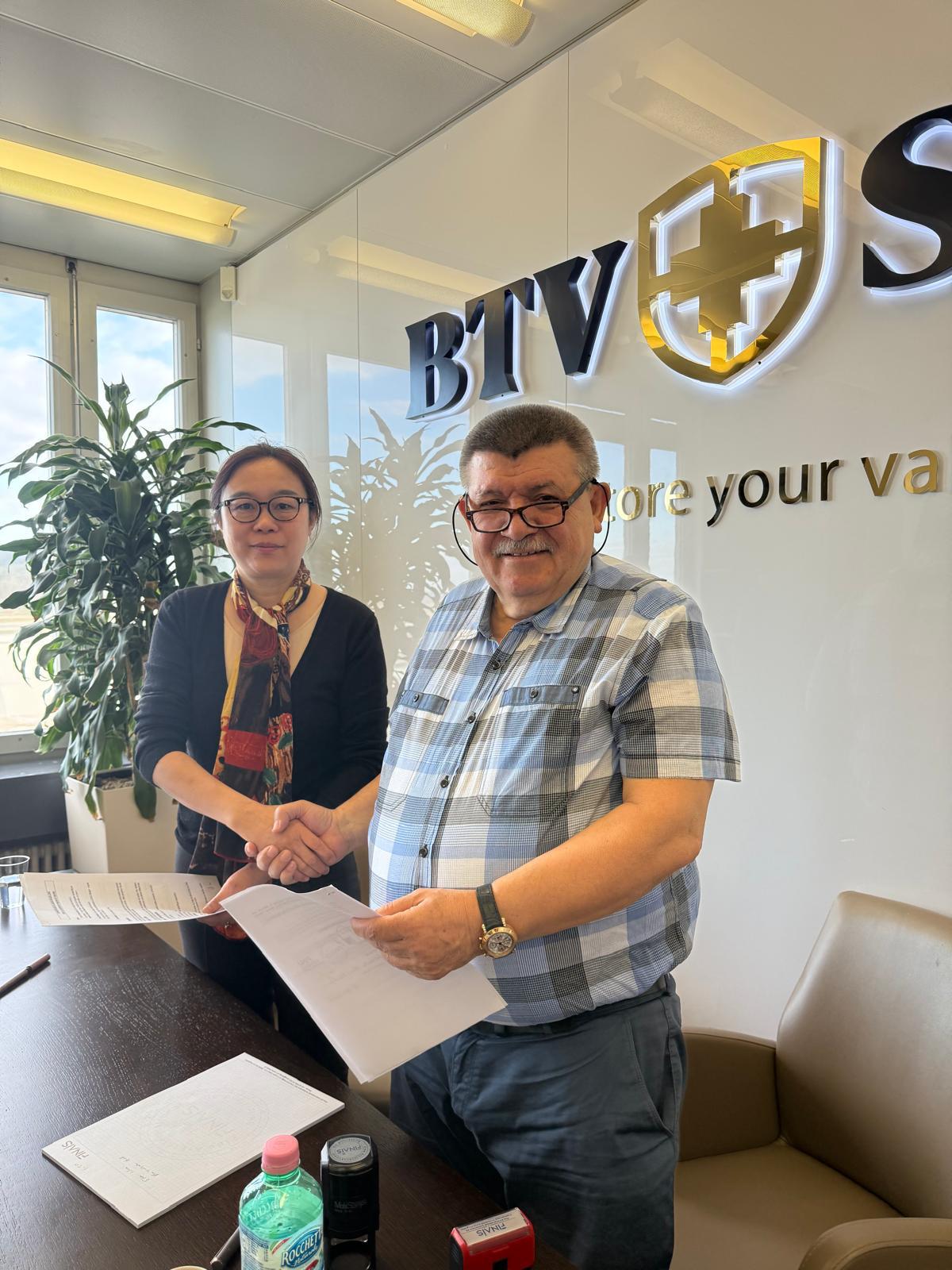 Andranik Ghazarian signing alongside (Agreement: Signature pages)
